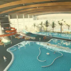 Wesoła zabawa w aquapark Lubin: zjeżdżalnie, baseny i palmy tworzą tropikalny klimat.