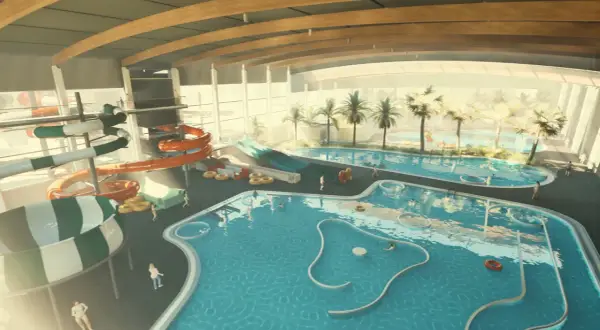 Wesoła zabawa w aquapark Lubin: zjeżdżalnie, baseny i palmy tworzą tropikalny klimat.
