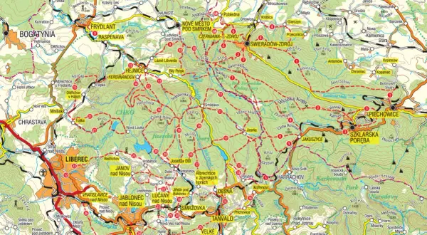 Mapa Gór Izerskich z zaznaczonymi szlakami turystycznymi, miejscowościami i wzniesieniami.