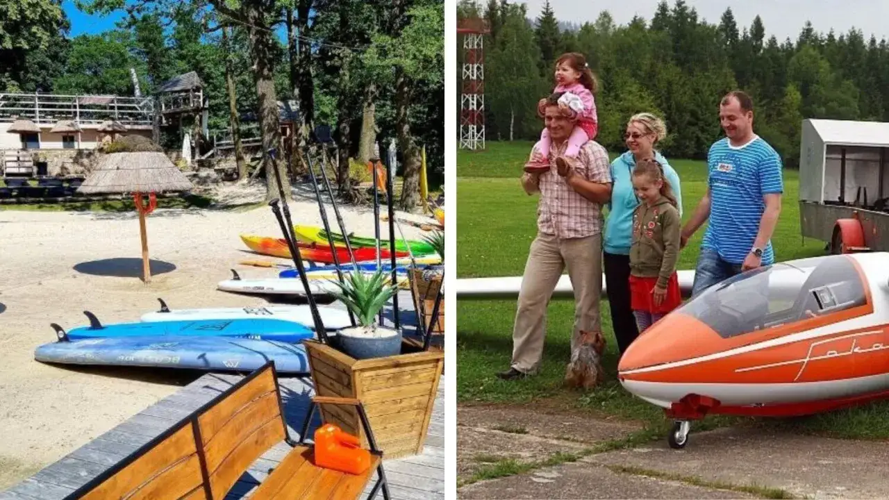 Deska SUP i kajaki czekają na plaży w parku rozrywki Jelenia Góra. Obok rodzina z dziećmi i małym pieskiem przy małym samolocie.