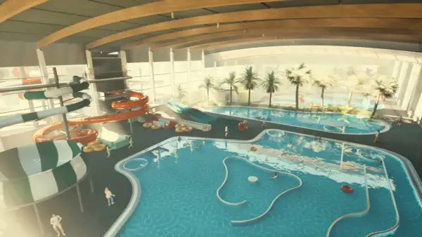 Wesoła zabawa w aquapark Lubin: zjeżdżalnie, baseny i palmy tworzą tropikalny klimat.